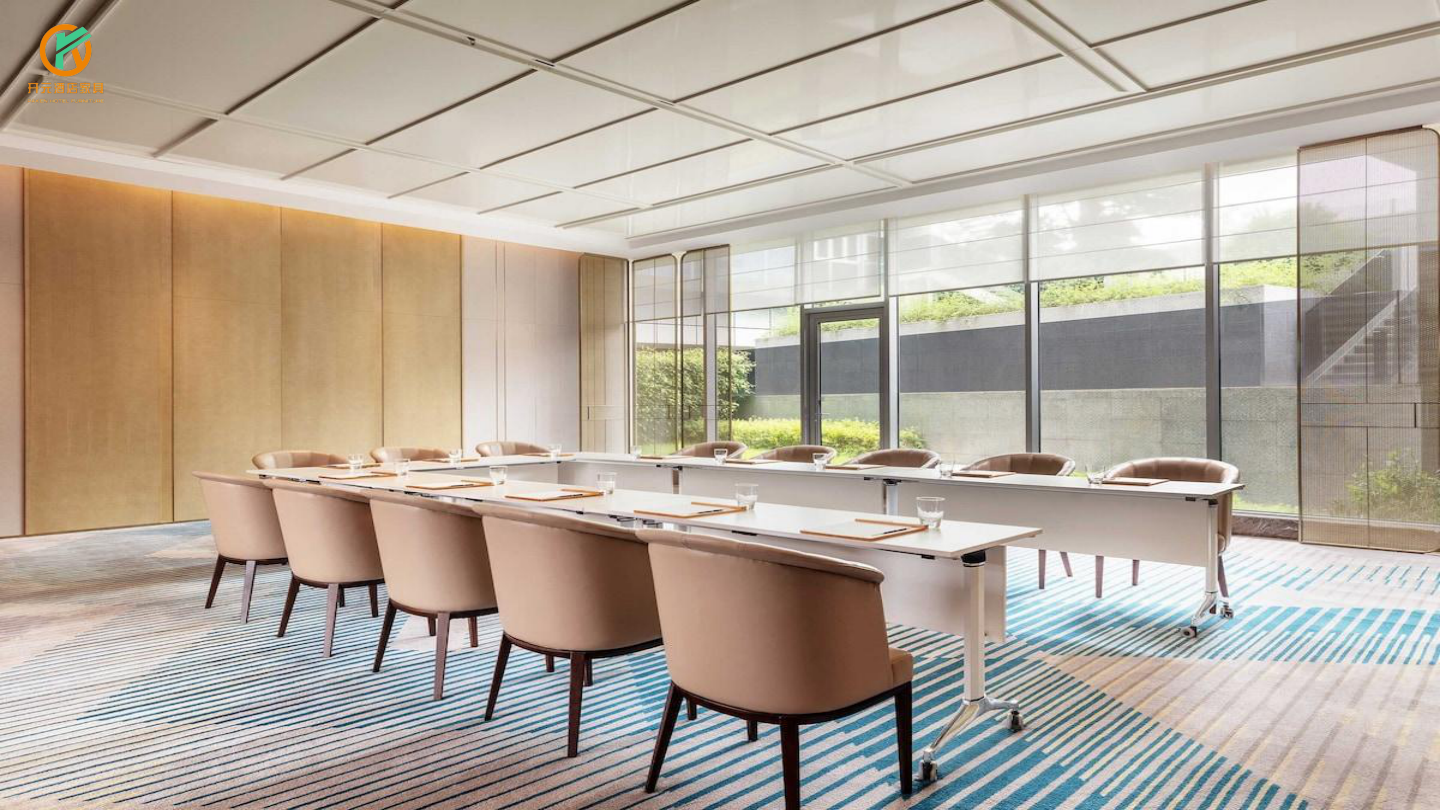 Supplier reference: daylight-filled hotel meeting room with a U-shaped table arrangement